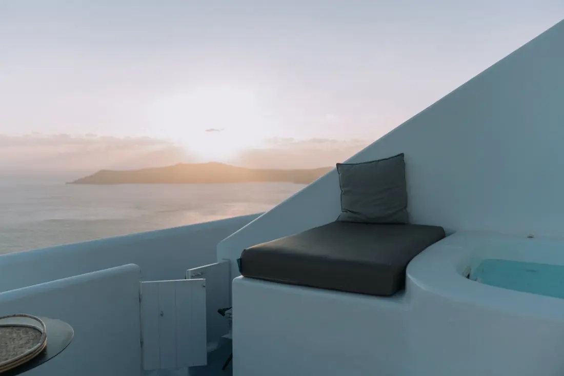 Illustrative photograph: Luxury Mediterranean terrace with sea view at sunset