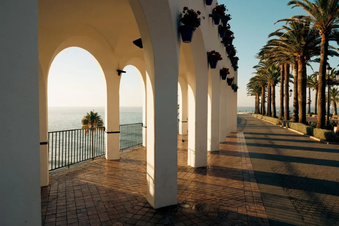Illustrative photograph: Sunset view through an archway in Nerja near Balcon de Europa
